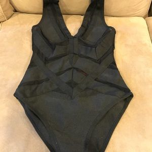 Black one piece size medium